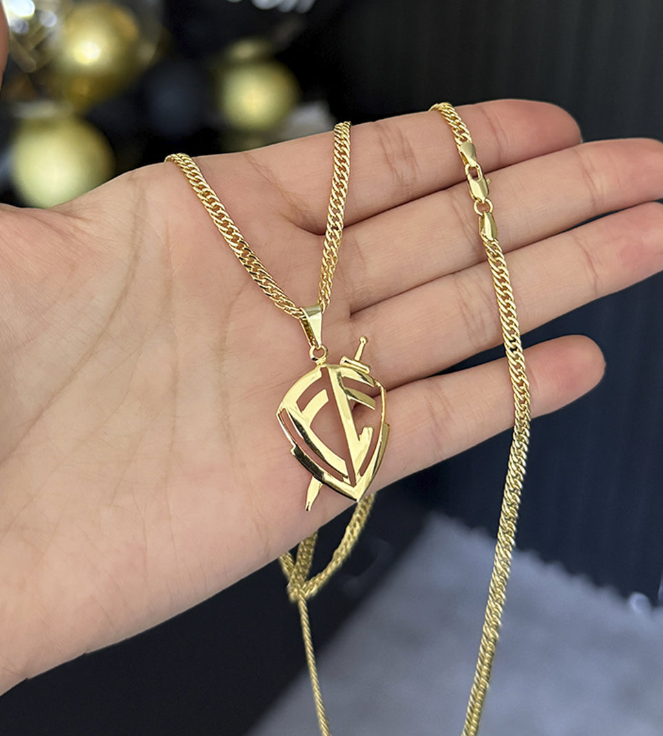 Corrente Grumet Dupla 3mm + Pingente Escudo Fé Vazado 3x2,5cm Banhada a Ouro 18k