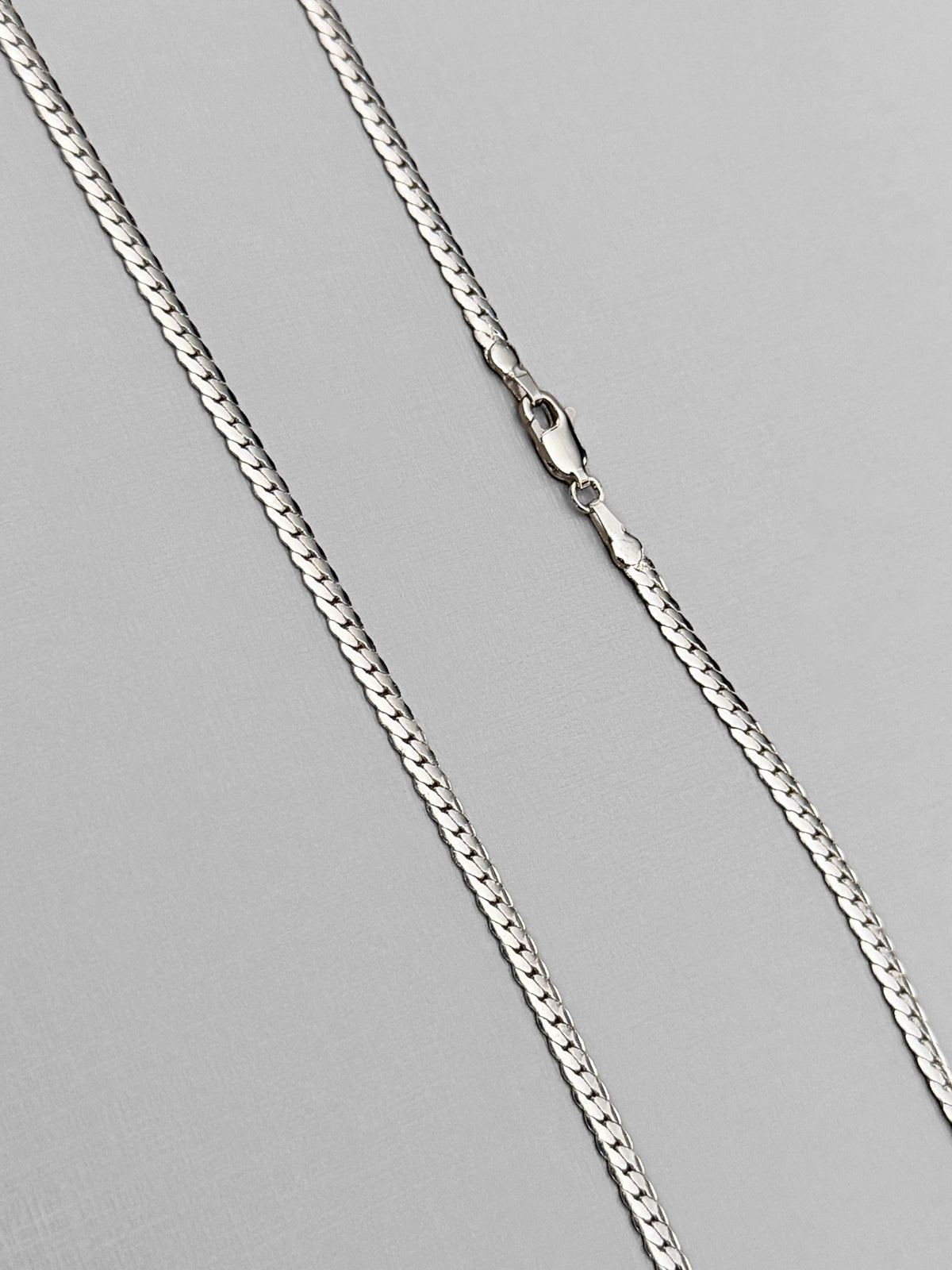 Corrente Grumet Flat 3mm Banhada a Ouro Branco